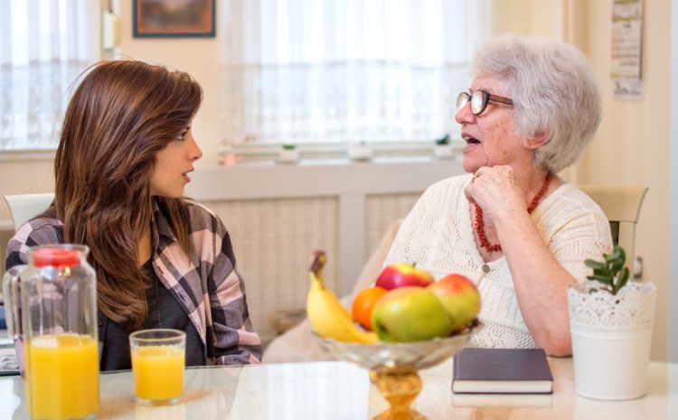 child talking with grandmother