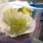 iceberg lettuce rinsed and ready for fridge storage