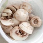 mushrooms cut and ready for fridge storage